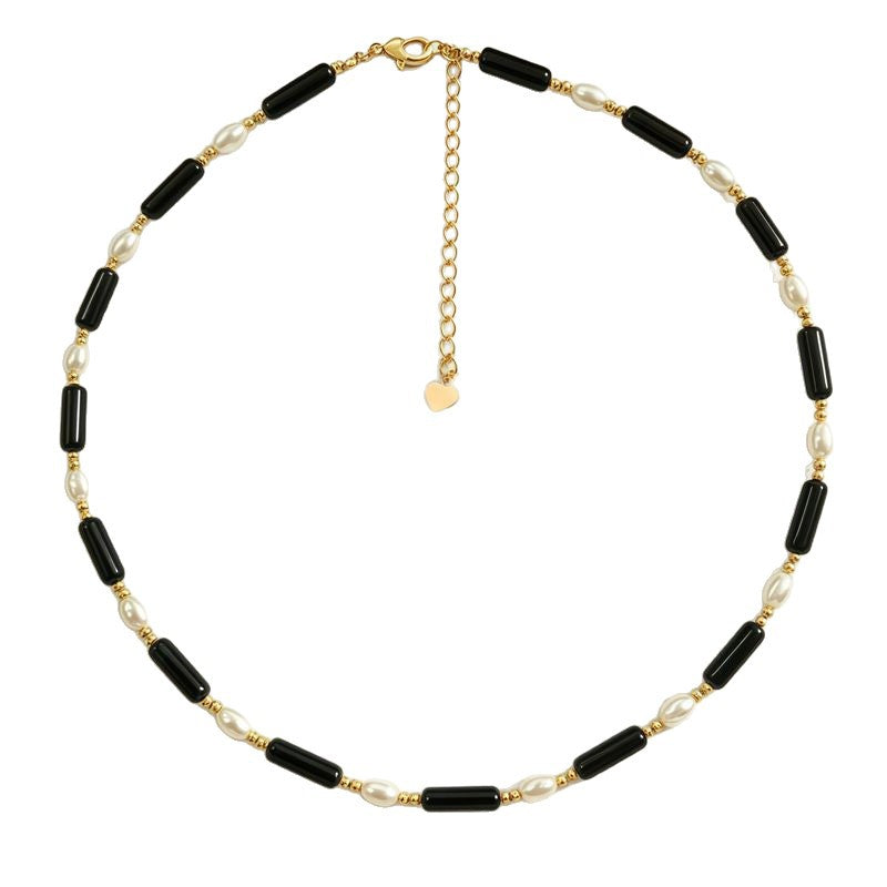 Rice grain freshwater pearl long black agate necklace, women's light luxury, cold wind, niche collarbone chain, black and white contrasting necklace