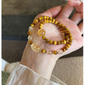 Double circle artificial citrine bracelet Pixiu fortune transfer imitation gold tiger's eye double circle bracelet niche design high-end sense