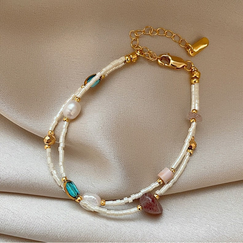 Double-layer freshwater pearl strawberry quartz millet bead bracelet for women, light luxury, niche fashionable blue crystal bracelet