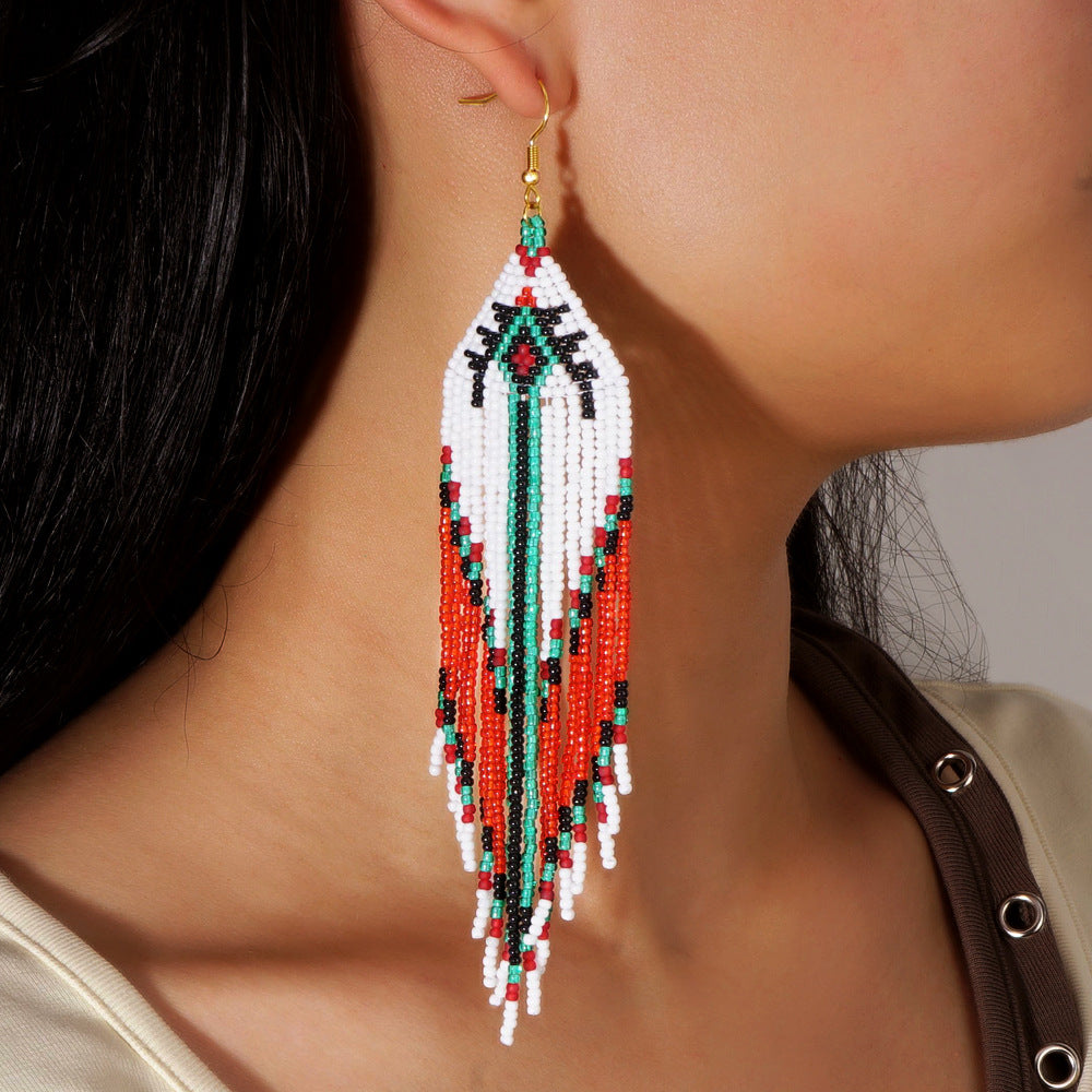 Cross-border European and American colored rice bead earrings, niche ethnic style handmade earrings, woven long tassel style, personality trend