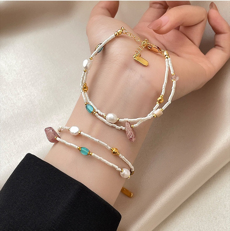 Double-layer freshwater pearl strawberry quartz millet bead bracelet for women, light luxury, niche fashionable blue crystal bracelet