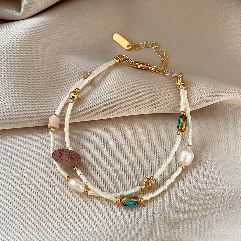 Double-layer freshwater pearl strawberry quartz millet bead bracelet for women, light luxury, niche fashionable blue crystal bracelet